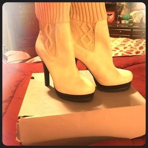 Jennifer Lopez sweater boots